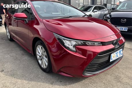 Red 2024 Toyota Corolla Sedan Ascent Sport