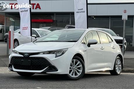 White 2023 Toyota Corolla Hatchback Ascent Sport Hybrid