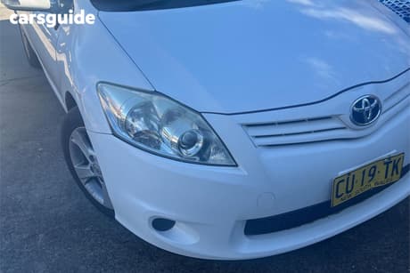 White 2010 Toyota Corolla Hatchback Conquest
