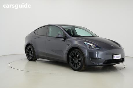 Silver 2023 Tesla Model Y Wagon Rear-Wheel Drive
