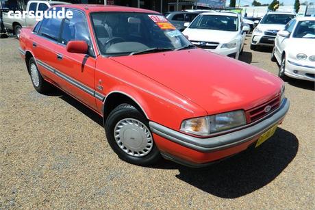 Red 1987 Ford Telstar Sedan Ghia