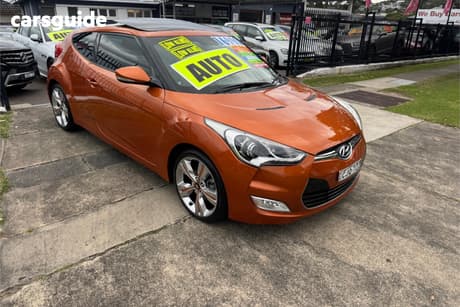 Orange 2012 Hyundai Veloster Coupe +