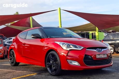 Red 2012 Hyundai Veloster Coupe +