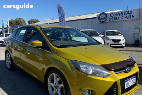Yellow 2011 Ford Focus Hatchback Titanium