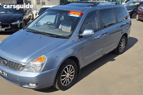 Blue 2011 Kia Grand Carnival Wagon Platinum