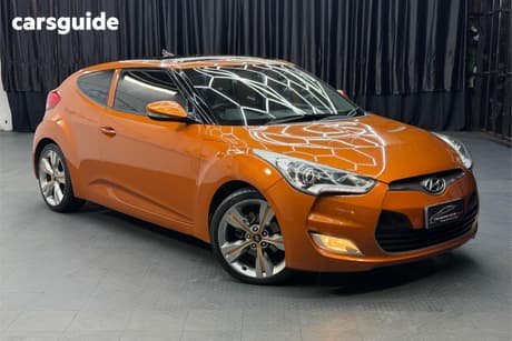 Orange 2012 Hyundai Veloster Coupe +