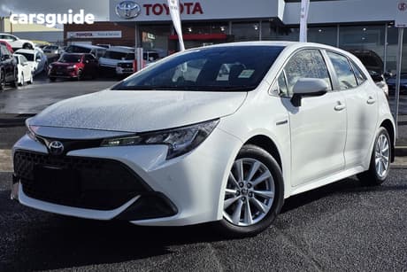 White 2023 Toyota Corolla Hatchback Ascent Sport Hybrid