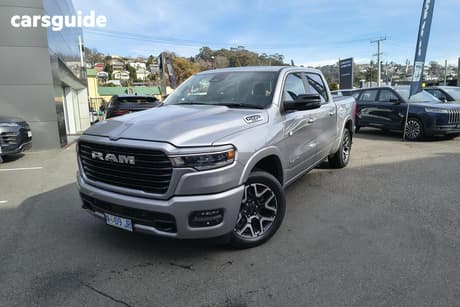 Silver 2025 RAM 1500 Crew Cab Utility Rebel Hurricane
