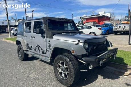 Silver 2015 Jeep Wrangler Unlimited Softtop Sport (4X4)