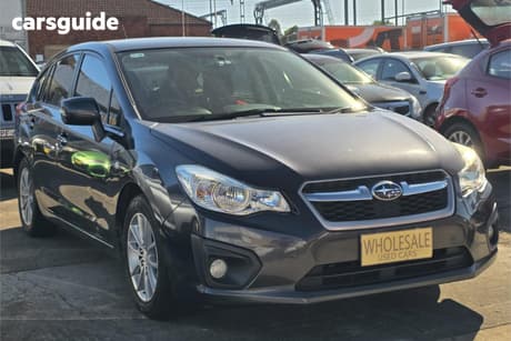 Black 2012 Subaru Impreza Hatchback 2.0I-L (Awd)