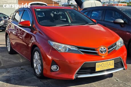 Orange 2012 Toyota Corolla Hatchback Ascent Sport