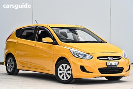 Yellow 2014 Hyundai Accent Hatchback Active