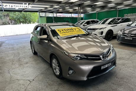 Beige 2013 Toyota Corolla Hatchback Ascent Sport