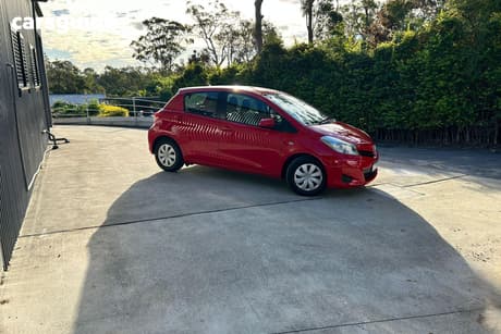 Red 2011 Toyota Yaris Hatchback Yr