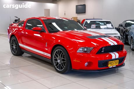 Red 2011 Ford Mustang Coupe GT500
