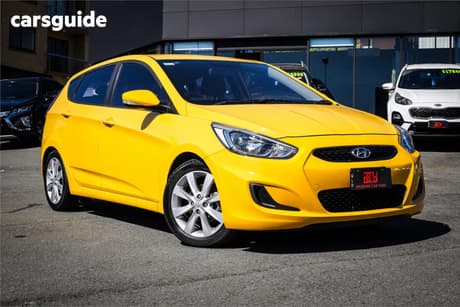 Yellow 2018 Hyundai Accent Hatchback Sport