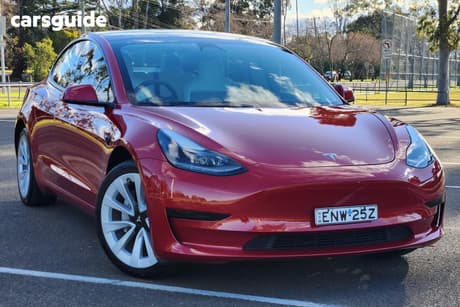 Red 2021 Tesla Model 3 Sedan Standard Range Plus Rwd