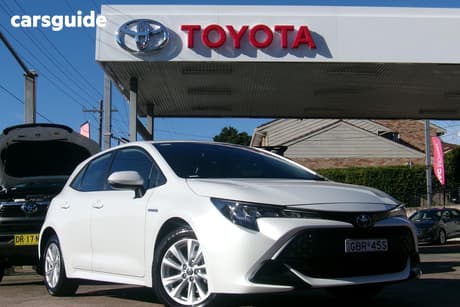 White 2023 Toyota Corolla Hatchback Ascent Sport Hybrid