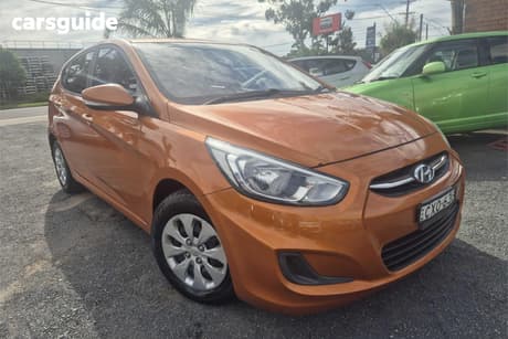Orange 2015 Hyundai Accent Hatchback Active