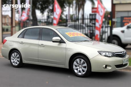 Gold 2010 Subaru Impreza Sedan R (Awd)