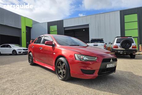 Red 2012 Mitsubishi Lancer Sedan Lx