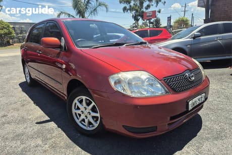 Red 2002 Toyota Corolla Hatchback Ascent Seca