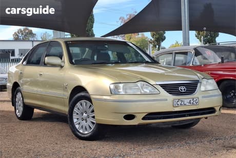 Gold 2004 Toyota Avalon Sedan Gxi