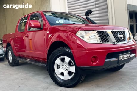 Red 2010 Nissan Navara Dual Cab Pick-up St (4X4)