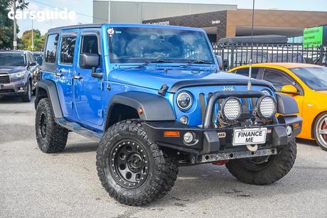 Blue 2014 Jeep Wrangler Softtop Unlimited Sport (4X4)