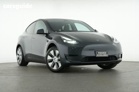 Silver 2023 Tesla Model Y Wagon Rear-Wheel Drive