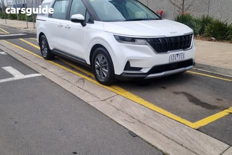 White 2023 Kia Carnival Wagon S