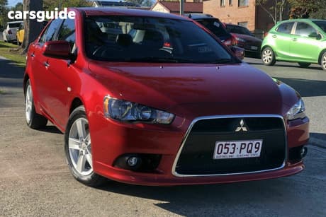 Red 2014 Mitsubishi Lancer Sedan Lx