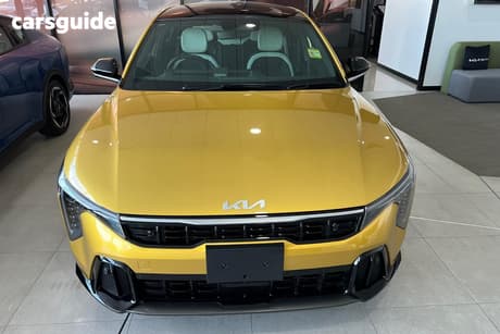 Yellow 2026 Kia K4 Hatchback Gt-Line