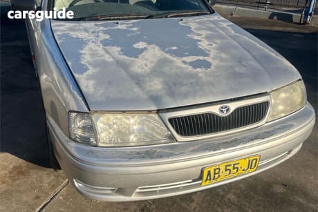 White 2001 Toyota Avalon Sedan CONQUEST