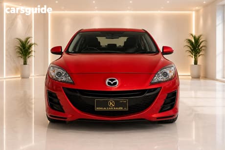 Red 2010 Mazda 3 Sedan Maxx