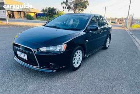 Black 2012 Mitsubishi Lancer Sedan Es