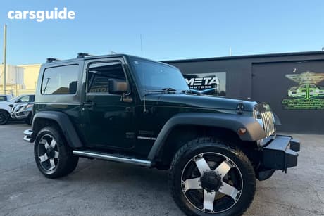 Green 2010 Jeep Wrangler Softtop Sport (4X4)
