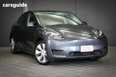 Silver 2023 Tesla Model Y Wagon Rear-Wheel Drive