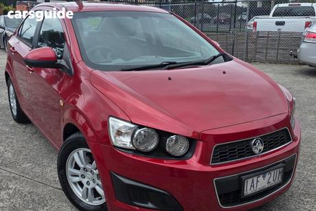 Red 2012 Holden Barina Sedan Cd