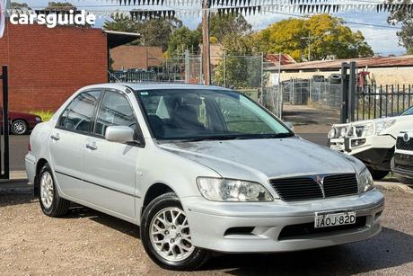 Silver 2002 Mitsubishi Lancer Sedan Exceed