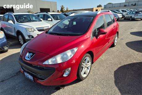 Red 2011 Peugeot 308 Wagon Touring Sportium