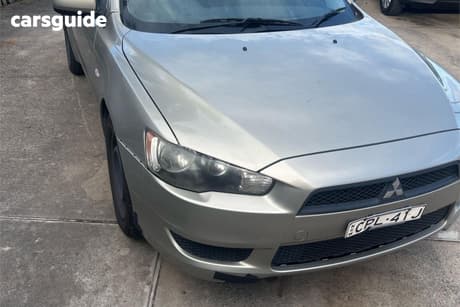 Silver 2011 Mitsubishi Lancer Sedan Es