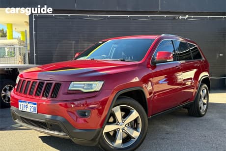 Red 2013 Jeep Grand Cherokee Wagon Laredo (4X4)
