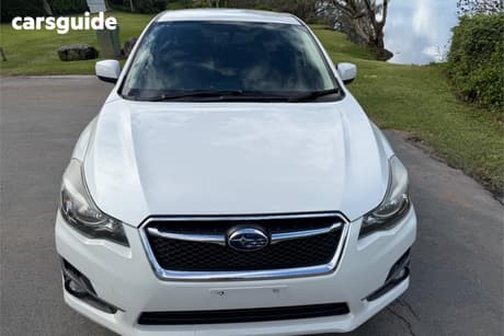 White 2015 Subaru Impreza Hatchback 2.0I Premium (Awd)