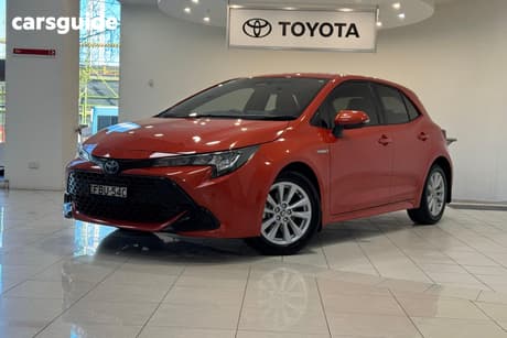 Orange 2023 Toyota Corolla Hatchback Ascent Sport