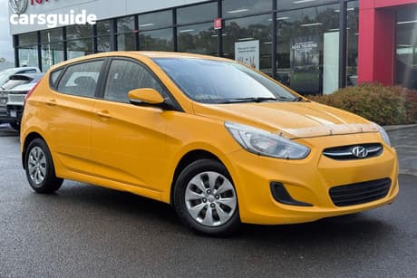 Yellow 2016 Hyundai Accent Hatchback Sr