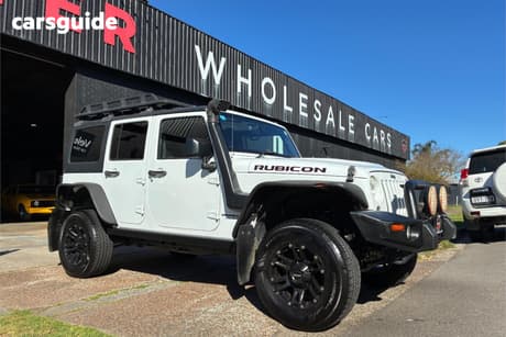 White 2014 Jeep Wrangler Unlimited Softtop Rubicon X (4X4)