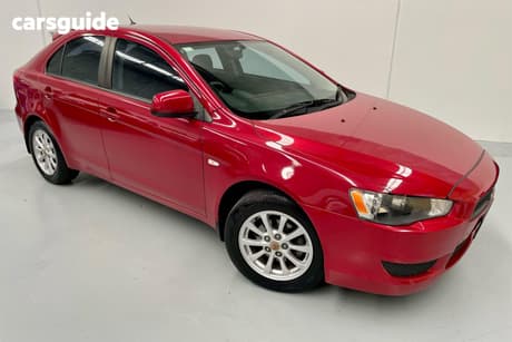 Red 2010 Mitsubishi Lancer Sedan Sx