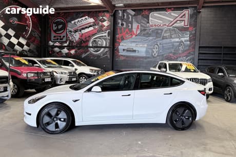 White 2021 Tesla Model 3 Sedan Standard Range Plus Rwd