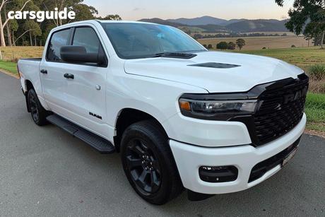 White 2026 RAM 1500 Crew Cab Utility Express Black Edition